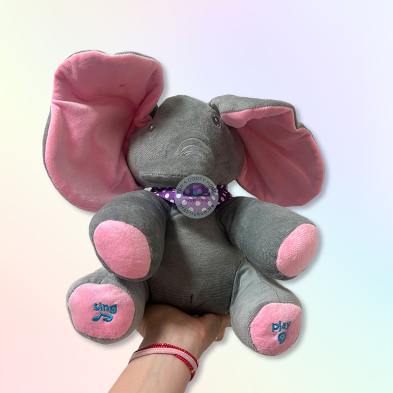 Плюшена играчка Слонче Куку-Бау 33 x 16 см, Пее и Играе, С Ушички за Покриване на Лицето - Image 3